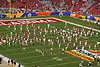 Players lined up on the football field before the game